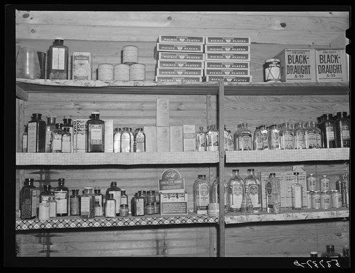 Medicine and drug shelf in country store which has doctor's office in rear. Faulkner County, Arkansas