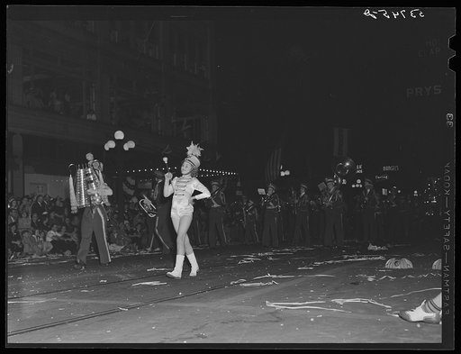 Girl drum major in night street parade during cotton carnival. Memphis, Tennessee
