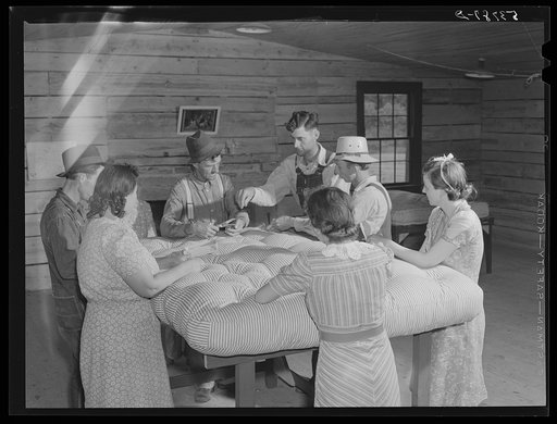 Farmers and wives tufting mattress in making-unit. Community service center, Faulkner County, Centerville, Arkansas (see general caption)