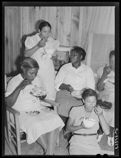 Home demonstration club meeting has games and refreshments after discussion. La Delta Project, Thomastown, Louisiana