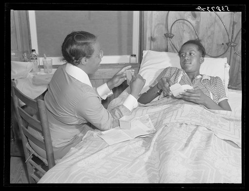 Nurse Marguerite White treating a patient. La Delta Project, Thomastown, Louisiana