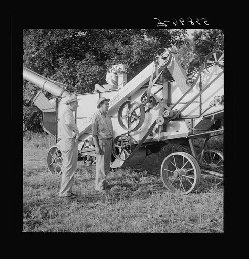 Untitled photo, possibly related to: Cooperative oat thrasher, purchased by E.H. Lester through FSA (Farm Security Administration) community co-op service loan. West Carroll Parish, Louisiana