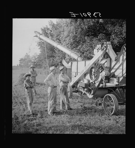 Untitled photo, possibly related to: Cooperative oat thrasher, purchased by E.H. Lester through FSA (Farm Security Administration) community co-op service loan. West Carroll Parish, Louisiana