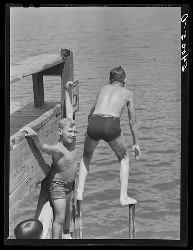 On Saturday afternoons and Sundays boys and children from nearby farms and neighborhoods go swimming in Lake Providence, Louisiana