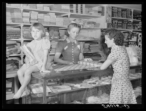 Buying dress goods in project cooperative store. Transylvania Project, Louisiana