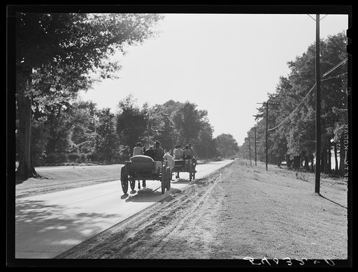 Untitled photo, possibly related to: Returning home with wagons loaded with entire family and supplies on Saturday evening. Lake Providence, Louisiana