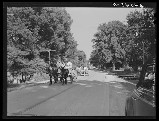 Untitled photo, possibly related to: Returning home with wagons loaded with entire family and supplies on Saturday evening. Lake Providence, Louisiana