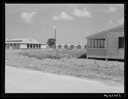 Untitled photo, possibly related to: Showers for both babies and older children and for parents and complete laundry facilities are provided in the utility building for members of the Osecola migratory labor camp. Belle Glade, Florida