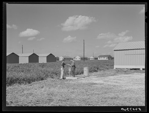 Untitled photo, possibly related to: Showers for both babies and older children and for parents and complete laundry facilities are provided in the utility building for members of the Osecola migratory labor camp. Belle Glade, Florida