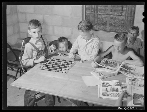 The assembly building is always open for games, reading, recreation and meetings at Osceola migratory camp. Belle Glade, Florida