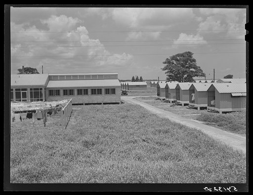Untitled photo, possibly related to: Showers for both babies and older children and for parents and complete laundry facilities are provided for members of the Okeechobee migratory labor camp. Belle Glade, Florida