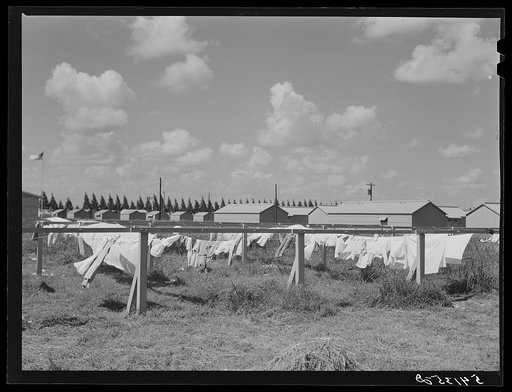 Untitled photo, possibly related to: Showers for both babies and older children and for parents and complete laundry facilities are provided in the utility building for members of the Okeechobee migratory labor camp. Belle Glade, Florida