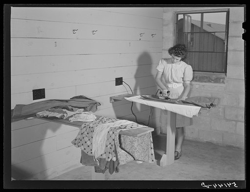 Showers for both babies and older children and parents and complete laundry facilities are provided in the utility building for members of the Osceola migratory labor camp. Belle Glade, Florida