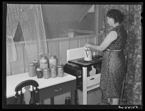 Interior of one of camp member's shelters, showing vegetables recently canned. Osceola migratory labor camp. Belle Glade, Florida