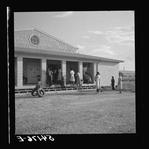 Untitled photo, possibly related to: The assembly building is always open for meetings, games, reading, and recreational activities at Okeechobee migratory labor camp. Belle Glade, Florida