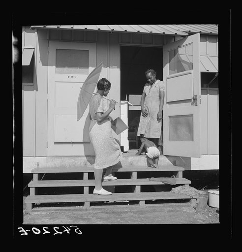 Untitled photo, possibly related to: Home management supervisor Corinne Williams visits one of the families in Okeechobee migratory labor camp. Belle Glade, Florida