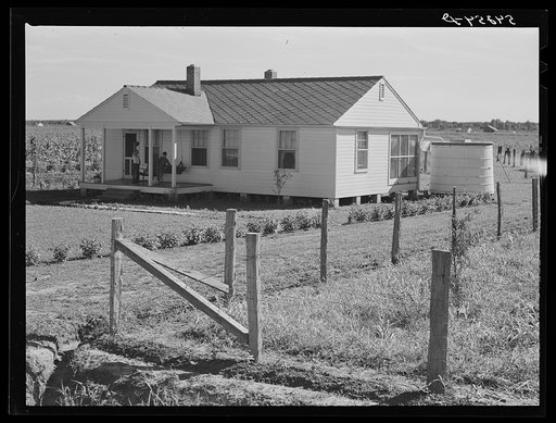 Untitled photo, possibly related to: Home with covered cistern for water and fenced garden on Terrebonne Project. Schriever, Louisiana