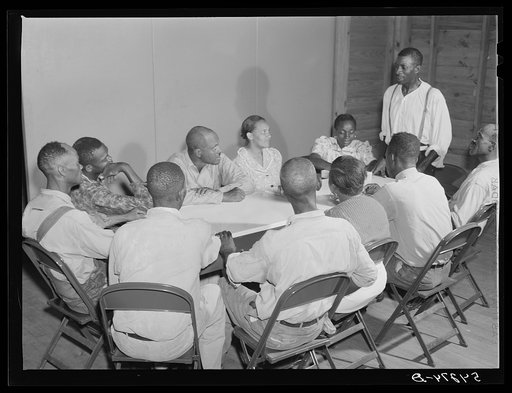 Untitled photo, possibly related to: The camp council meets to discuss any problems, improvements and plans; sometimes takes a vote and decides that an undesireable and uncooperative family should leave. Okeechobee migratory labor camp, Belle Glade, Florida