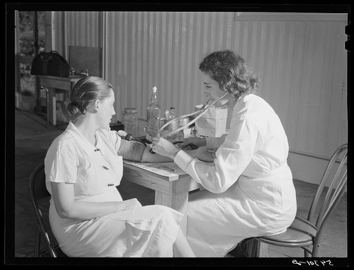 Untitled photo, possibly related to: The project nurse takes a member's blood pressure during the prenatal clinic. Terrebonne Project, Schriever, Louisiana
