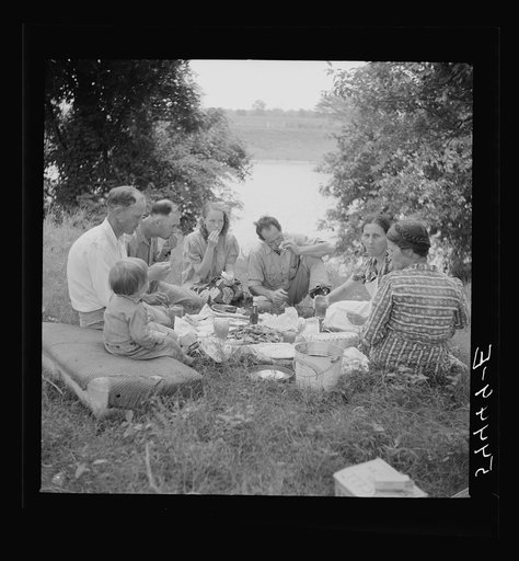 Untitled photo, possibly related to: Farm family having fish fry along Cane River on Fourth of July near Natchitoches, Louisiana