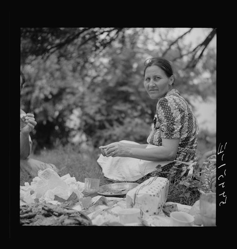 Farm family having fish fry along Cane River on Fourth of July near Natchitoches, Louisiana