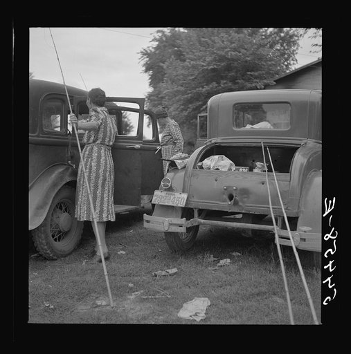 Farm family getting out their fishing poles to catch catfish in Cane River, near Natchitoches, Louisiana