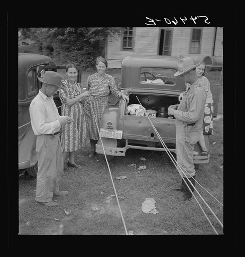 Untitled photo, possibly related to: Farm family getting out their fishing poles to catch catfish in Cane River, near Natchitoches, Louisiana