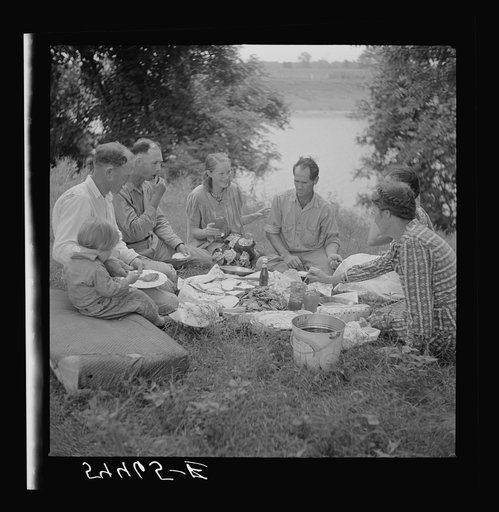 Farm family having fish fry along Cane River on Fourth of July near Natchitoches, Louisiana