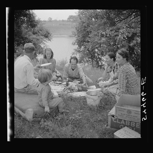 Farm family having fish fry on July Fourth along Cane River. Near Natchitoches, Louisiana