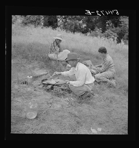 Farm family having fish fry along Cane River on Fourth of July near Natchitoches, Louisiana