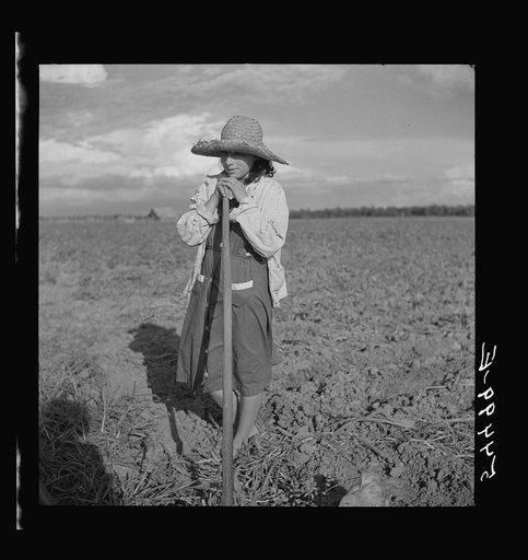 Untitled photo, possibly related to: Member of Allen Plantation cooperative association resting from hoeing cotton. Near Natchitoches