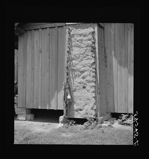 Melrose, Natchitoches Parish, Louisiana. Chimney built of mud and sticks on home of mulatto family, a tenant on Balthazar Plantation (see general caption)