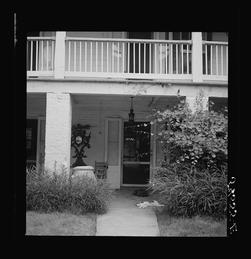 Untitled photo, possibly related to: Melrose, Natchitoches Parish, Louisiana. Main house on the John Henry cotton plantation, which was built by mulatto Augustin Metoyier for his son Louis. It was originally called Yucca Plantation (from Spanish). See general caption