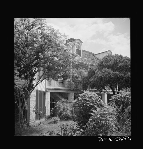 Untitled photo, possibly related to: Melrose, Natchitoches Parish, Louisiana. Main house on the John Henry cotton plantation, which was built by mulatto Augustin Metoyier for his son Louis. It was originally called Yucca Plantation (from Spanish). See general caption