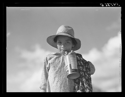 Untitled photo, possibly related to: Melrose, Natchitoches Parish, Louisiana. Daughter of mulatto family returning home after fishing in the Cane River