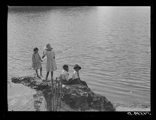 Untitled photo, possibly related to: Melrose, Natchitoches Parish, Louisiana. Mulatto children fishing in the Cane River