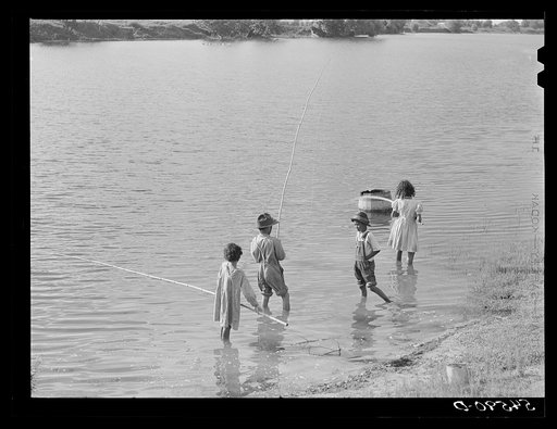 Untitled photo, possibly related to: Melrose, Natchitoches Parish, Louisiana. Mulatto children fishing the Cane River