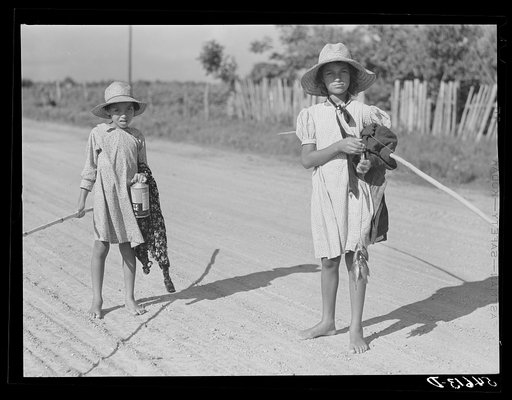 Melrose, Natchitoches Parish, Louisiana. Children of mulatto family returning home after an afternoon fishing in Cane River