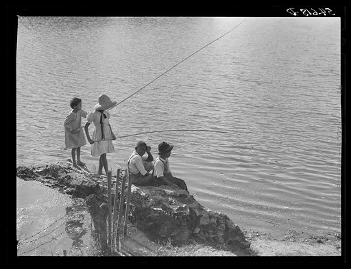 Melrose, Natchitoches Parish, Louisiana. Mulatto children fishing in the Cane River