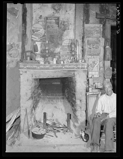 Melrose, Natchitoches Parish, Louisiana. Fireplace in old mud hut built and still lived in by French mulattoes near John Henry cotton plantation.  Belongs to Rocque family (see general caption)