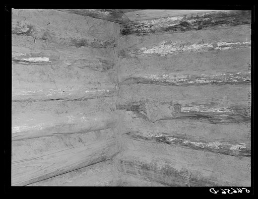 Melrose, Natchitoches Parish, Louisiana. Mud and log construction in old house originally built and owned by mulattoes, now a part of John Henry cotton plantation. Purchased by him from mulattoes in 1833. Metoyier built it. It was originally called Yucca Plantation (from Spanish). See general captio