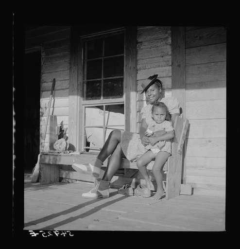 Negro worker who does housework when not picking cotton. Near Natchitoches, Louisiana