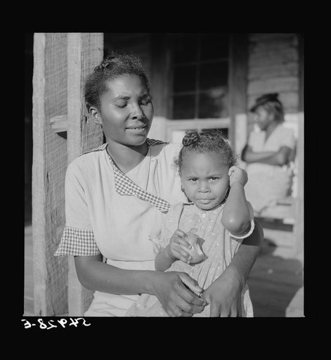 Negro worker who does housework when not picking cotton. Near Natchitoches, Louisiana