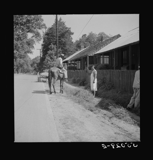 Untitled photo, possibly related to: Street scene on Saturday afternoon in Natchez, Mississippi