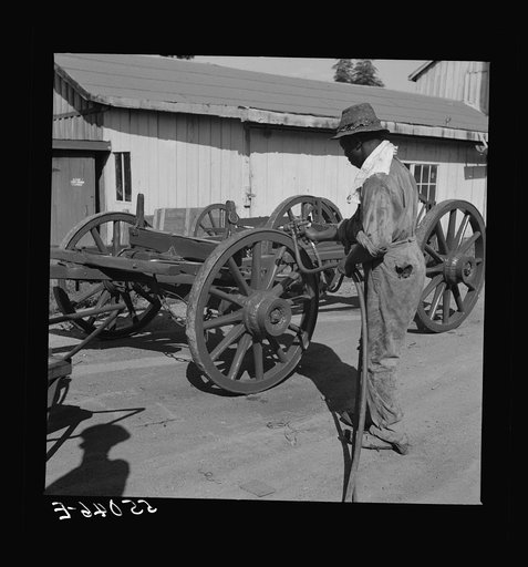 On the King and Anderson cotton plantation near Clarksdale. Mississippi Delta, Mississippi. All the wagons are built and painted and most of the repair work done in their own shops