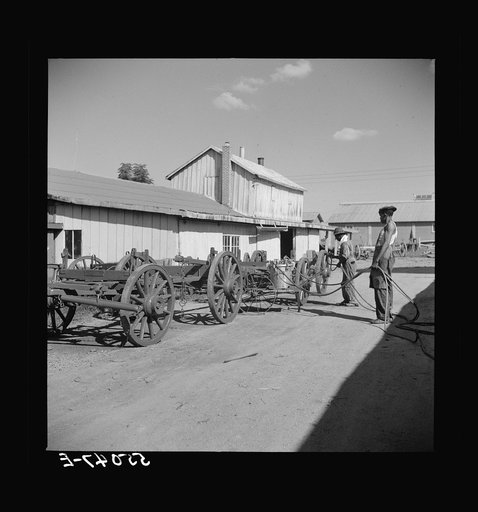 On the King and Anderson cotton plantation near Clarksdale. Mississippi Delta, Mississippi. All the wagons are built and painted and most of the repair work done in their own shops