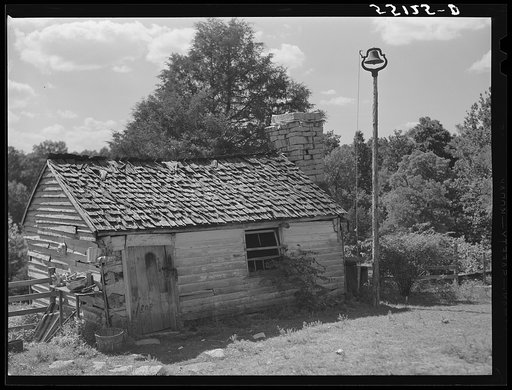 Untitled photo, possibly related to: Former slave quarters now used as milk house on farm near Bardstown, Kentucky