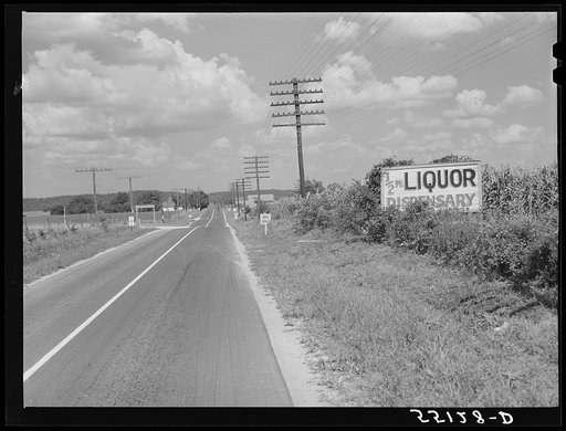 Signs advertising liquor stores are seen frequently along all Kentucky highways. South of Bardstown