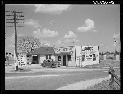 Signs advertising liquor stores are seen frequently along all Kentucky highways. South of Bardstown