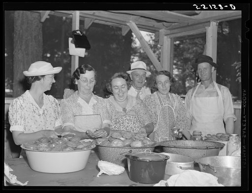 Untitled photo, possibly related to: Parishioners peeling and slicing tomatoes for a benefit picnic supper on the grounds of Saint Thomas' Church. Near Bardstown, Kentucky